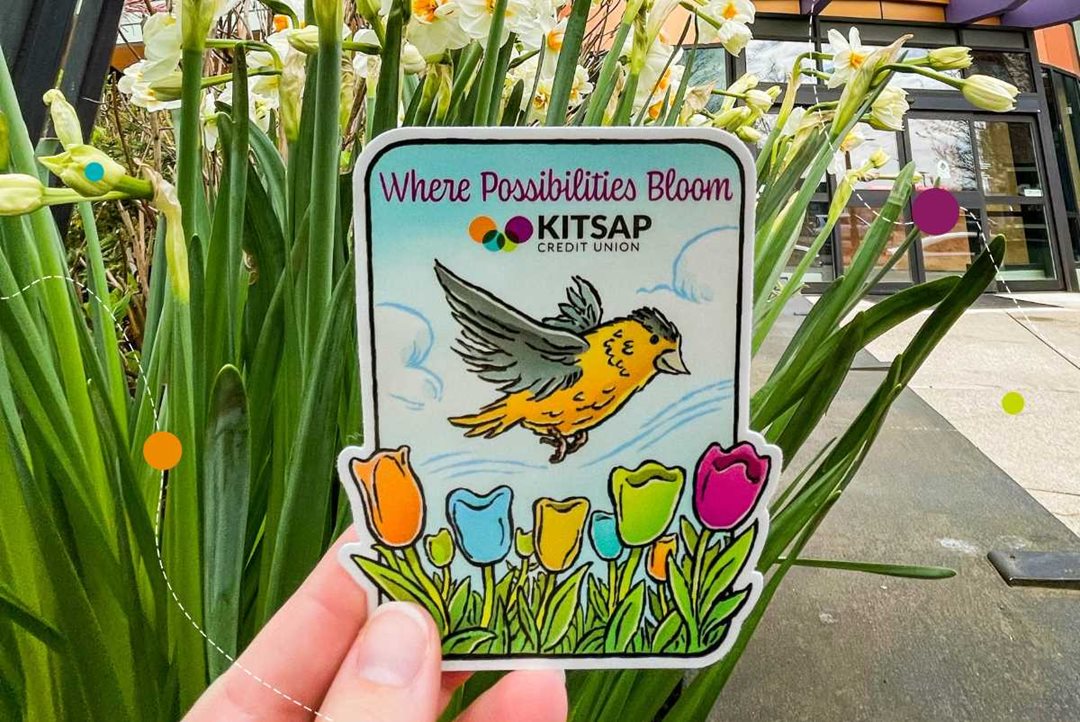 Sticker featuring bird soaring over tulips