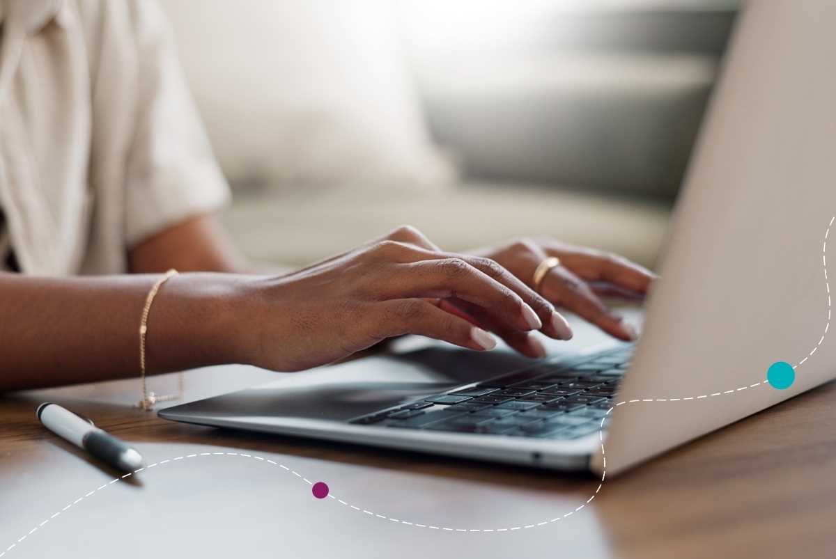 Person typing on a laptop